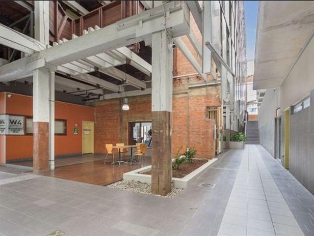 Two storey Historic wool store apartment 94m2 floor plan