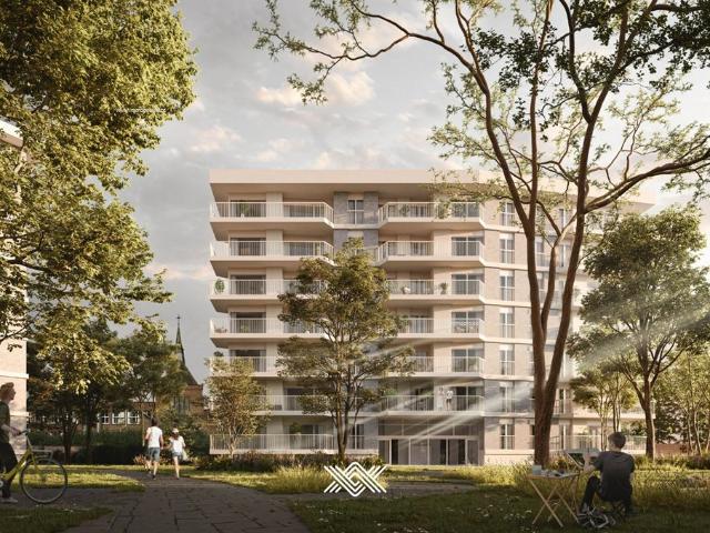 Tweeslaapkamer appartement met zicht op de Leie en binnentuin