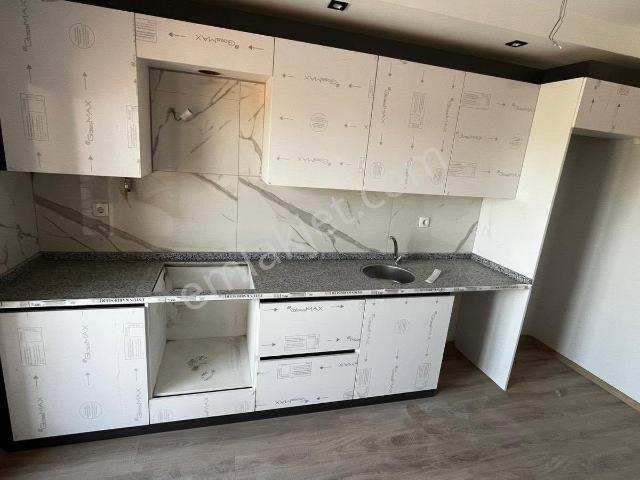 Turgutlu Kiralık Bozkurt Mah 95m2 2. Kat 2+1 Oda Sıfır Asansör Otopark Doğalgaz Mevcut