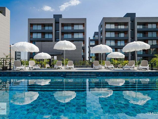 DENİZ KENARINDA !KUZEY KIBRIS GAZİMAĞUSA PALM BEACH SATILIK EŞYALI 2+1 3+1 SIFIR DAİRELER