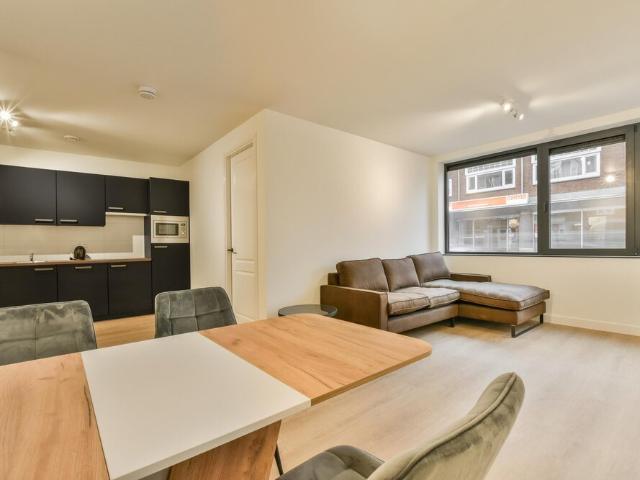 Tussenverdieping appartement met open portiek te huur in Zeist