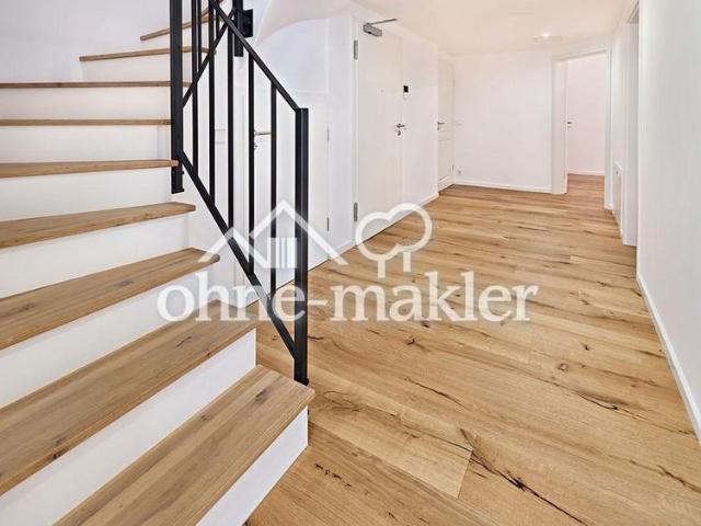 U6 Holzapfelkreuth: Top Moderne Wohnung mit Altbaucharme und Atriumgarten