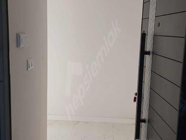 Ula Merkezde 2+1 Yerden Isıtmalı Lüx Sıfır Doğalgazlı Daire