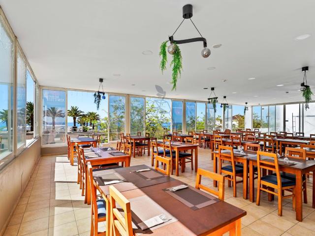 Um negocio com Alma de Verão Restaurante na Praia da Rocha