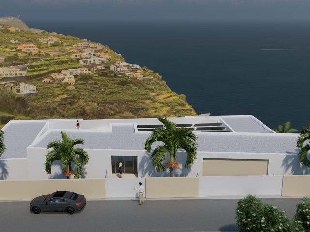 Uma Obra Prima de Elegância Moderna com Vista Mar na Calheta