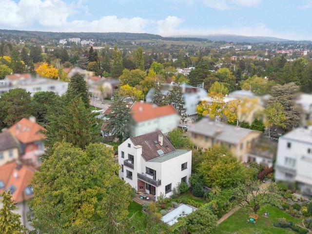 Umgeben von Grün: Architektenvilla in bester Maurer Lage