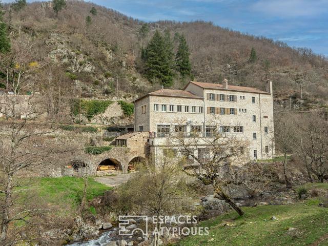 Un ancien moulinage aux multiples vies, entre rivière et nat. 650m² Saint Etienne de Serre