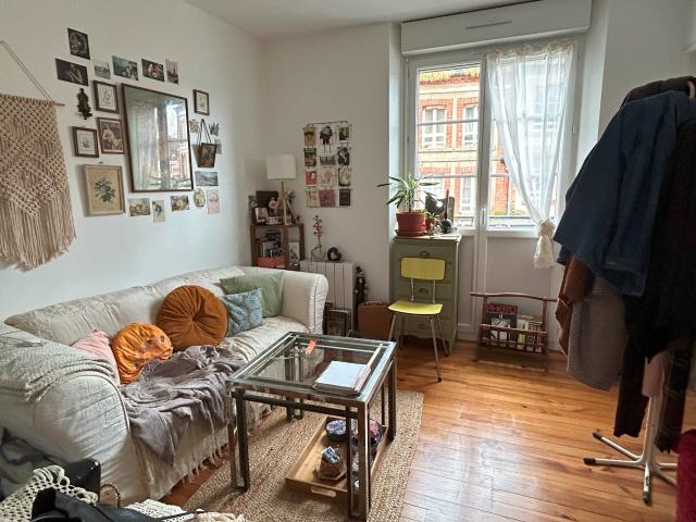 Un immeuble à usage commercial et d'habitation comprenant: Au rez de chaussée: local commercial 31m2 avec