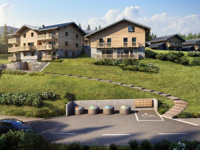 Un nouveau programme mixant appartements et chalets neufs, situé dans un cadre ensoleillé avec un arrêt ski bus à proximité