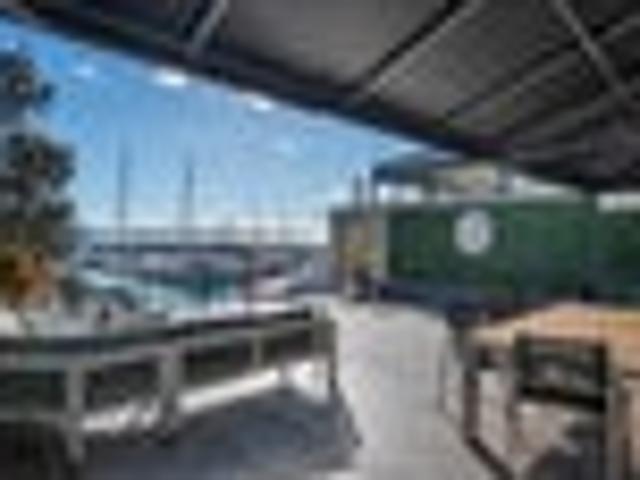 UNDER CONTRACT Waterfront, large deck and carpark