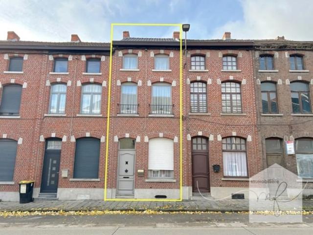 Une bonne maison non loin de la Grand'Place avec jardin