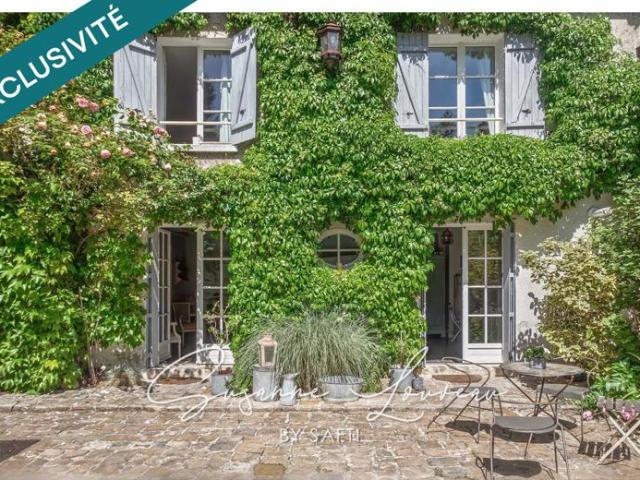 Une maison en pierre pleine de charme… avec un jardin que l'on n'attend pas