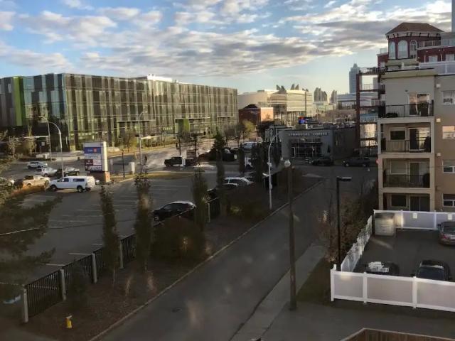Unique 2 level, 2 bdrm corner unit overlooking downtown