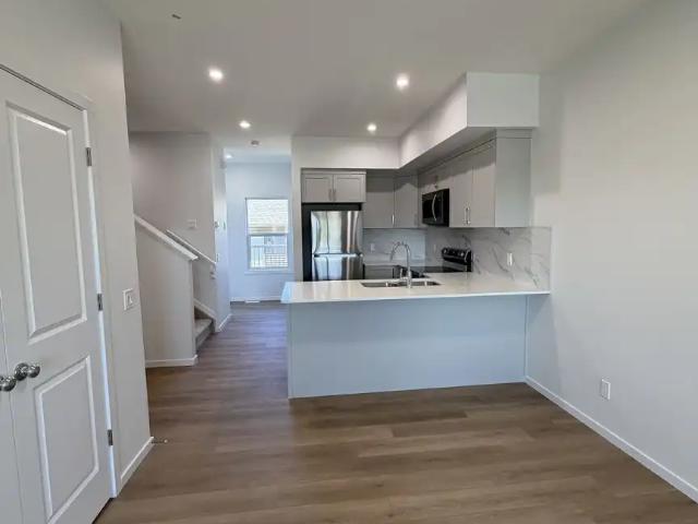 UPPER UNIT – Brand New 3 Bed + 2.5 Bath Townhome | Double Garage | Chappelle SW