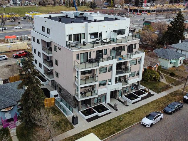 Upscale Condo near Downtown, 1 Bed 1 Bath Main Floor with Live/Work Option