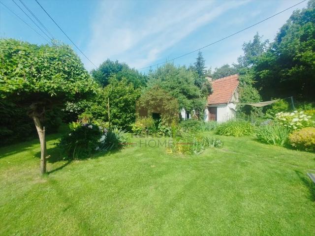 Urokliwy dom 102 m² z dużym ogrodem i garażem