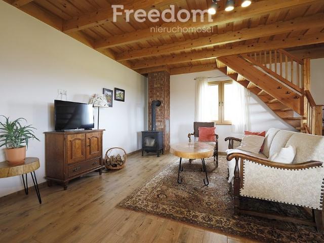 Urokliwy domek 35 m² z tarasem nad jeziorem Dauby