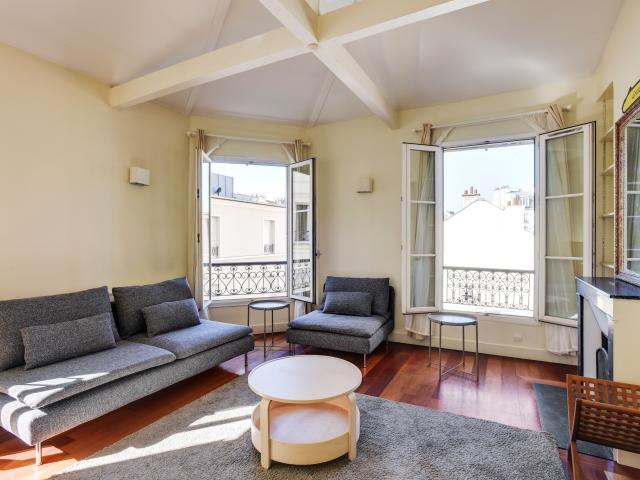 Urban Charm with Rooftop Elegance Paris