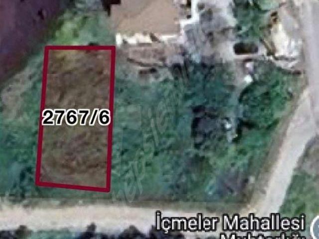 Urla Göçmen konutları caddesinde satılık arsa