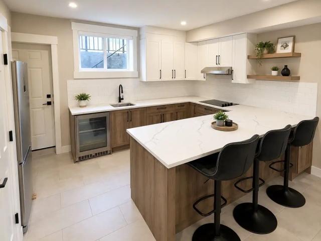 UTILITIES INCLUDED | 3 BEDROOM WALK UP BASEMENT SUITE WITH PRIVATE YARD