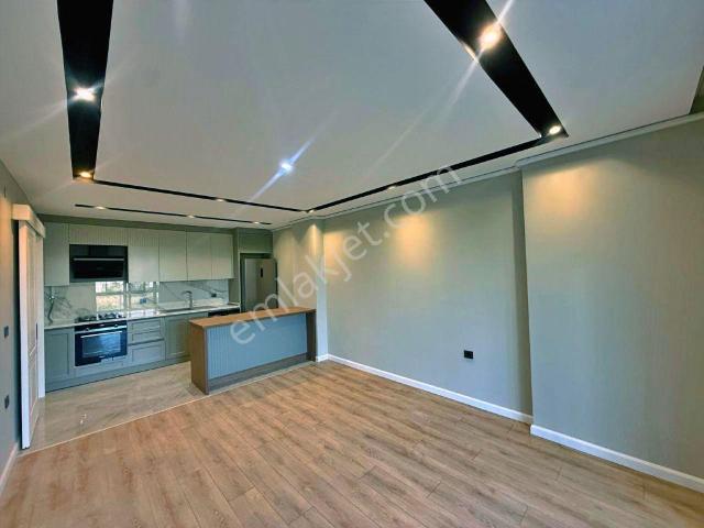 Uytundan Akçayda Önü Açık Yeşil Alan Yerden Isıtmalı Kiralık 1+1