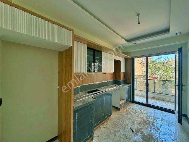 Uytundan Burhaniye Merkezde Doğalgazlı Sıfır 2+1 Satılık Daire