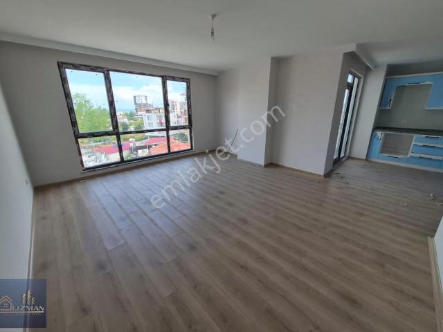 Uzman Emlak'tan Güzelyalı'da Deniz Manzaralı 2+1 Sıfır Daire