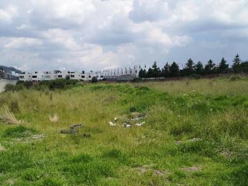 VENTA DE LOTE DE TERRENO FRENTE A CONDOMINIO IDILICA EN RINCONADA DE TECAXIC ZINACANTEPEC