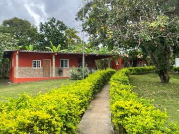 Venta: Lote de 4hcts en La Ermita de san Carlos con Casa y Cabañas