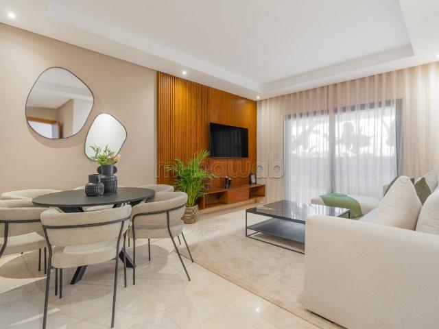 Vente d'un bel appartement à Ain Diab Extension. 3 pièces confortables. Parking et terrasse
