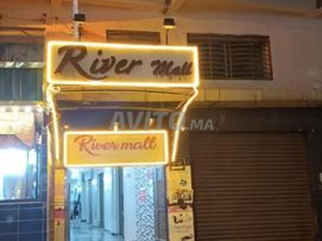 Vente magasin galerie River Mall