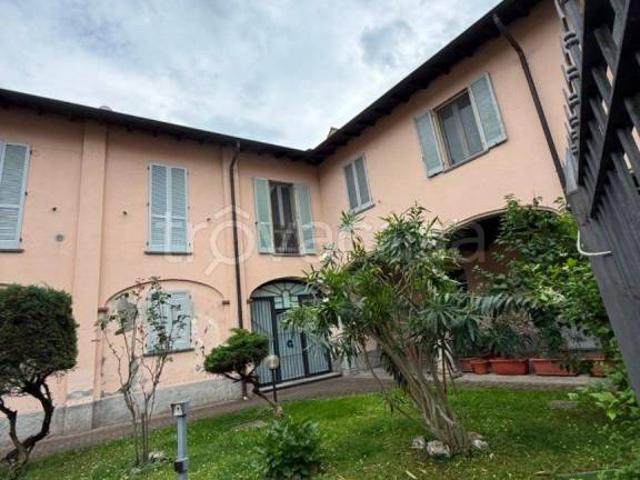 Vendesi trilocale a Cuggiono piazza San Giorgio