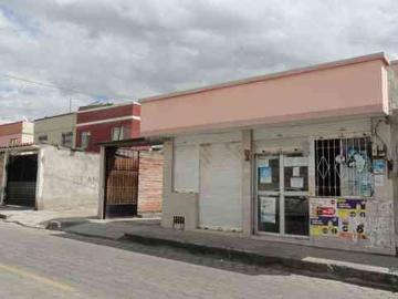 Vendo casa con locales comerciales en Otavalo