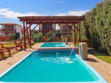 Vendo Lote o Casa en Condominio Ecologico Frente a la playa y Laguna Paraiso en Huacho