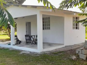 VENDO PEQUEÑA CASA DE CAMPO TERRENO DE 2,742 MT EN LLANO GRANDE CERCA A RIO HATO