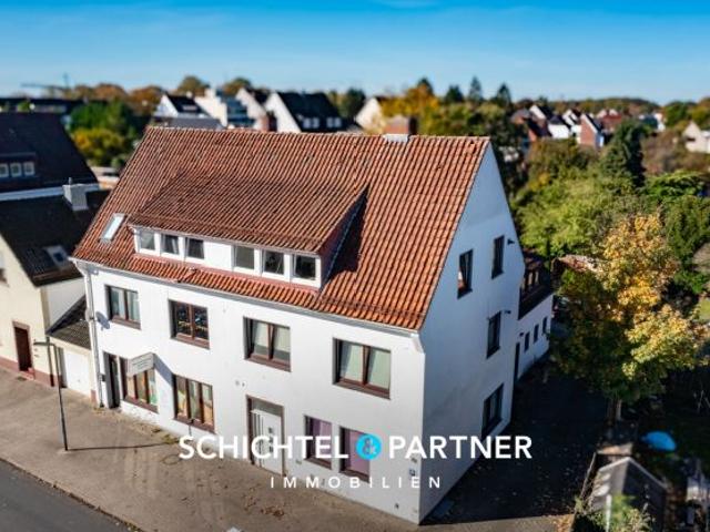 Vegesack | Mehrfamilienhaus mit Gewerbe, Garagen und großem Grundstück