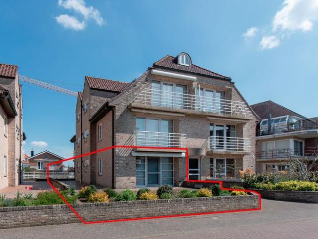 Verzorgd 2 slaapkamerappartement met zonneterras en tuin in