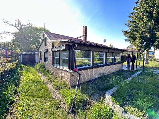 Ruhig vermietet – Bungalow mit Charme und großem Grundstück in Toplage von Hohen Neuendorf