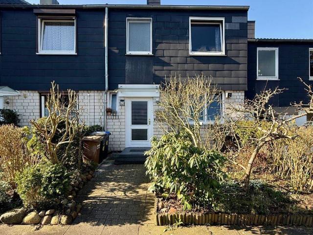 Vermietetes Reihenmittelhaus mit 4 Zimmern, Keller sowie Stellplatz / Tauernweg, Kiel