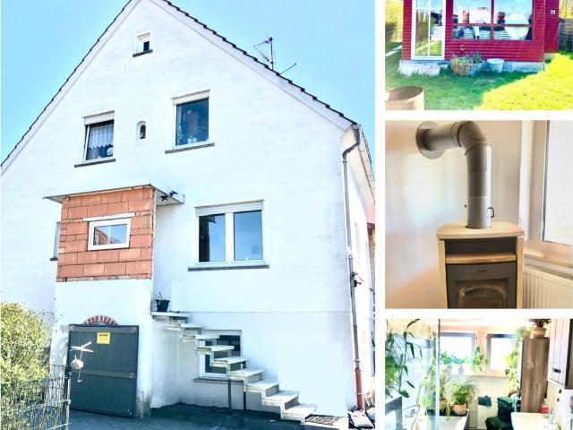 Vielfältiges Zweifamilienhaus auf großzügigem Grundstück mit Partyhaus !
