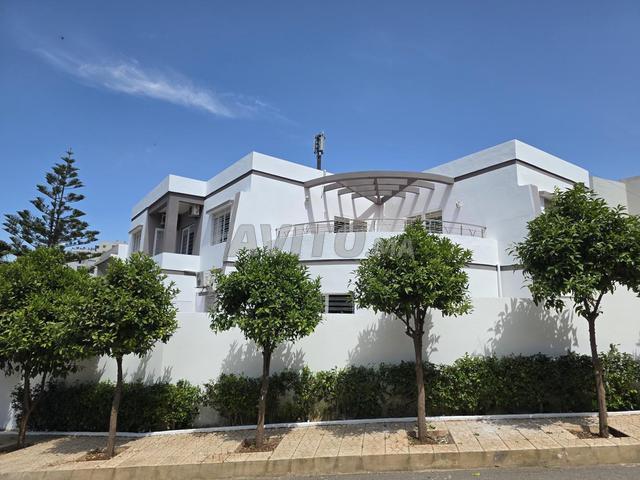 Villa trois façades luxe école référence