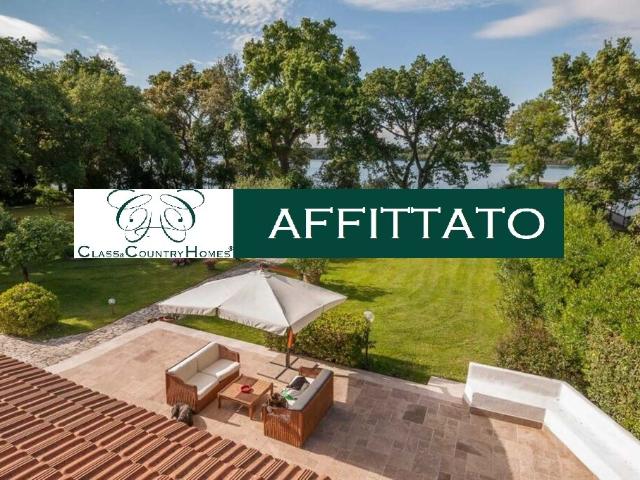 Villa a Sabaudia in Affitto: Prestigiosa Proprietà sul Lago di Paola