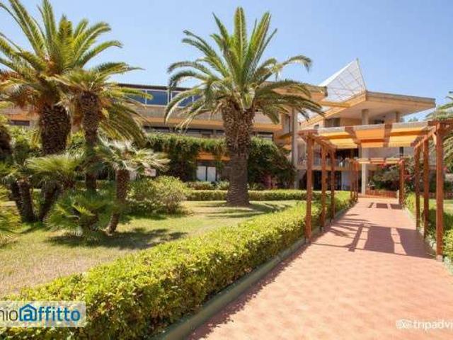 Villa a schiera arredata con piscina