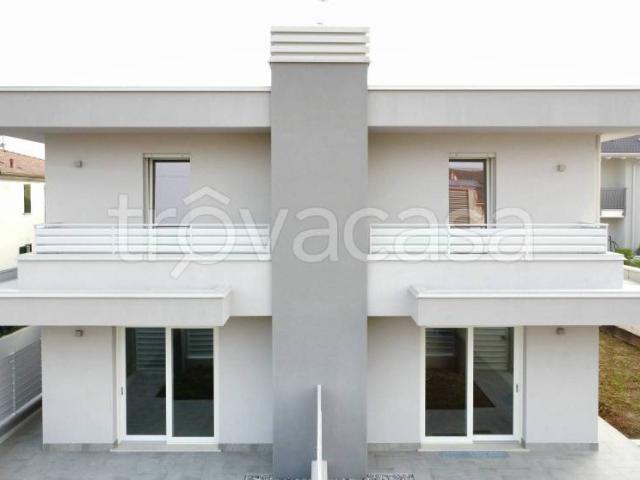 Villa bifamiliare in vendita a Castegnato via Achille Grandi