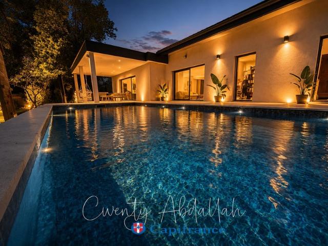 VILLA CONTEMPORAINE D'EXCEPTION – 192 m² DE PLAIN PIED AVEC PISCINE en limite de Gilly sur Isère 73