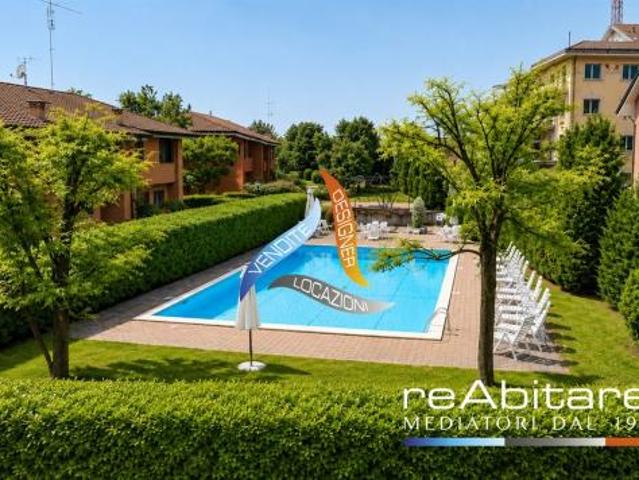 Villa con giardino privato e piscina nella Residenza “Le Garbine”