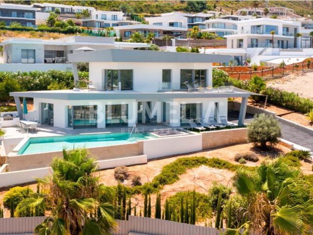 Villa de estilo moderno con vistas despejadas en venta en Já. 208m² Jávea Xabia