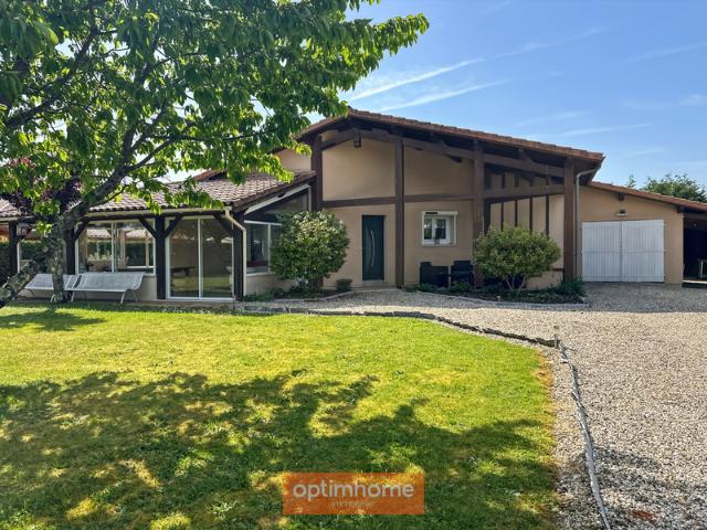 Villa de plain pied avec véranda en excellent état et à proximité des commerces, jardin, garage