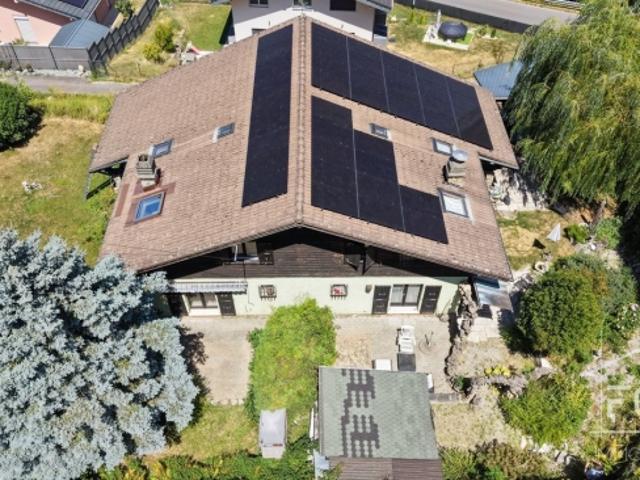 Villa mit 2 Wohnungen mit jeweils 5,5 Zimmern und Garten