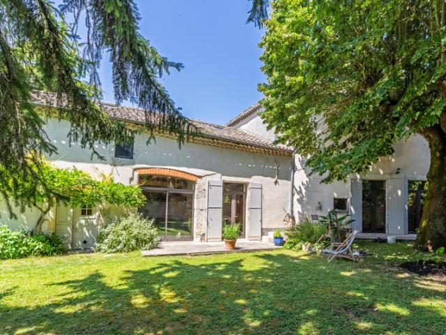 Village house with garden and garage